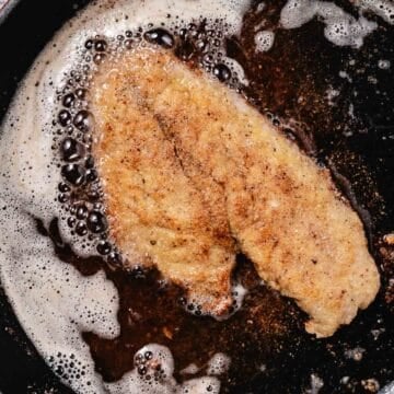 frying snapper in a skillet