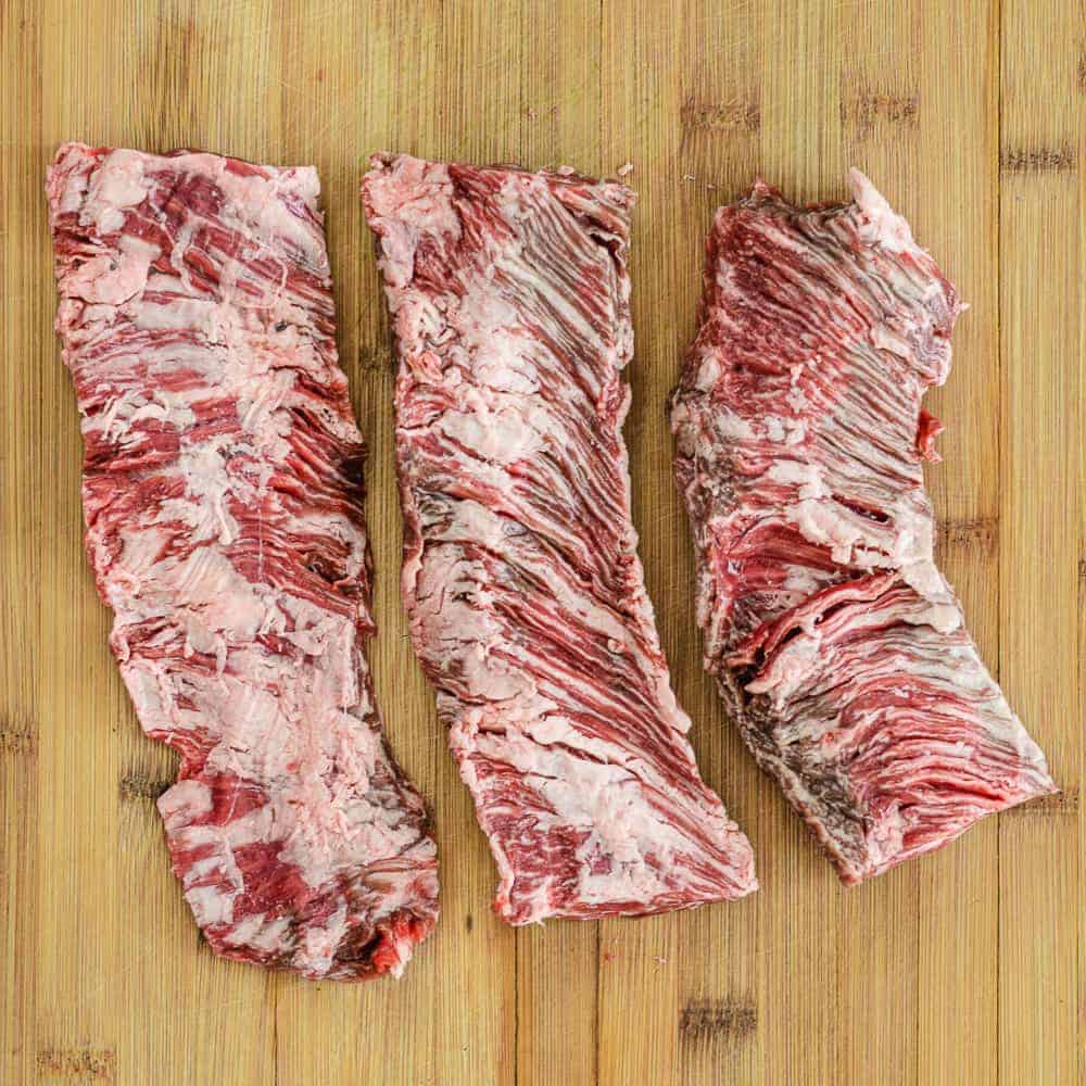 skirt steak on cutting board