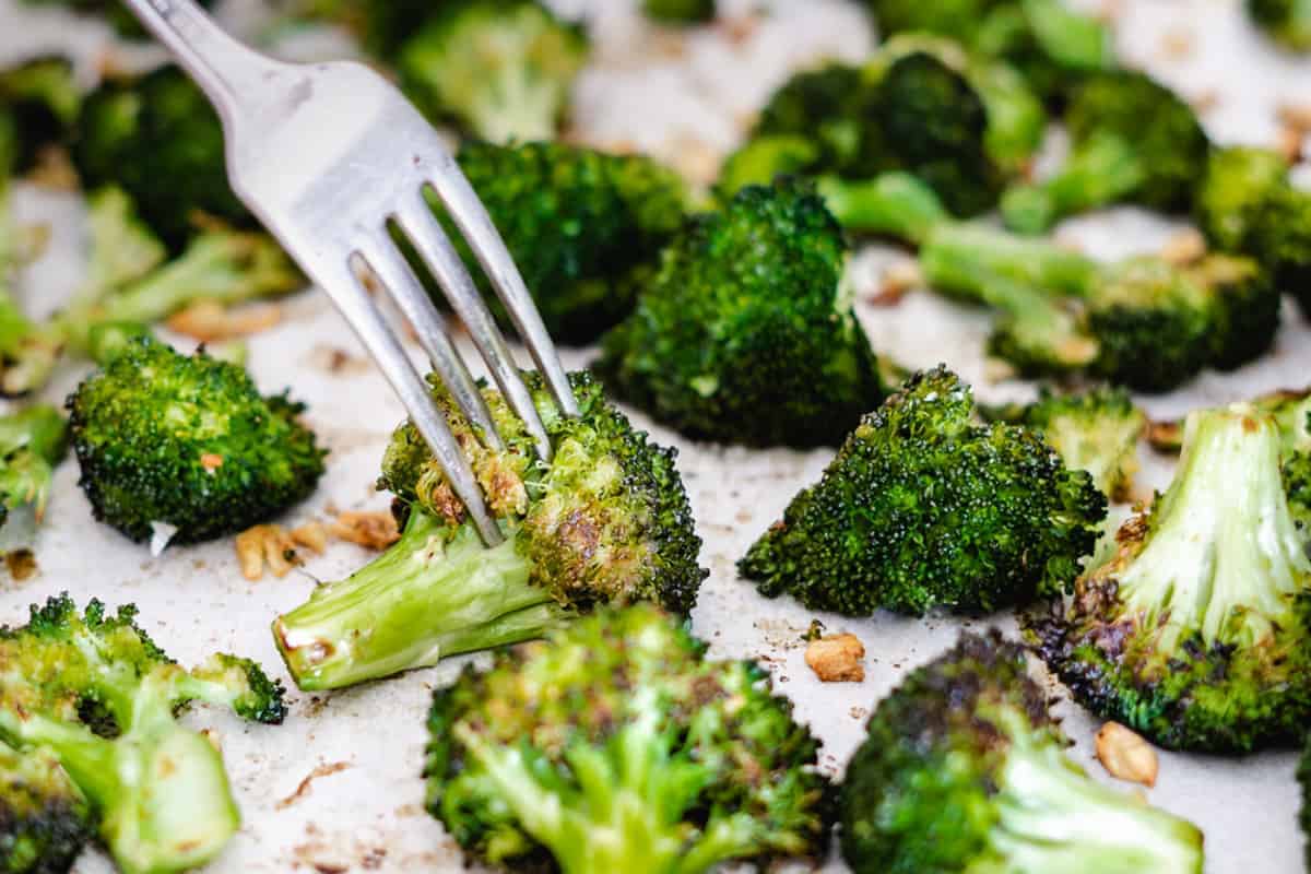 Broccoli with garlic on a sheet pan.
