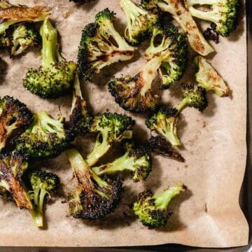 roasted broccoli with salt and pepper on sheet pan