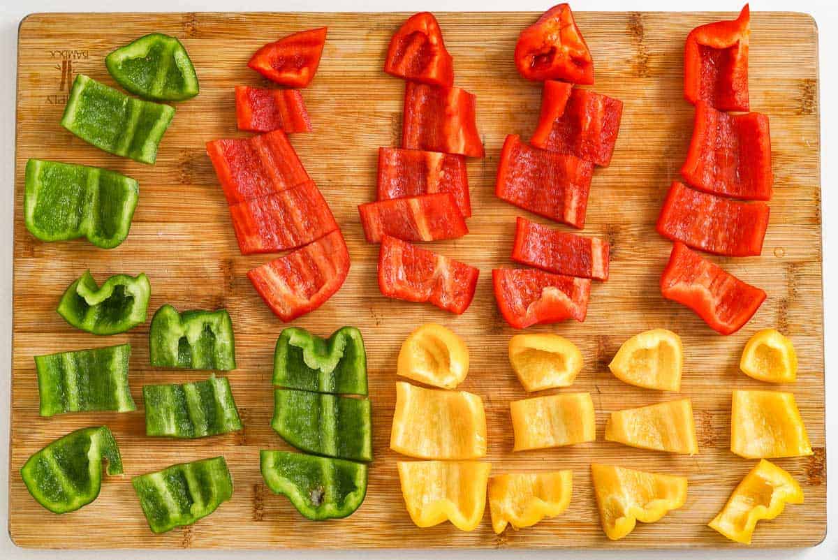bell peppers cut like chips on a board.