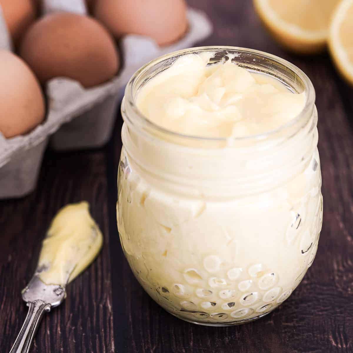 Homemade mayonnaise in a jar.