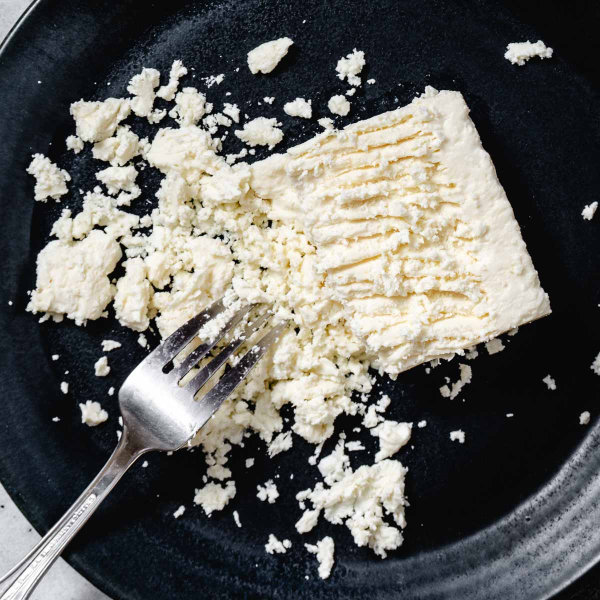 crumbling feta cheese