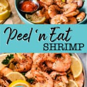 shrimp with lemon and cocktail sauce in a bowl.