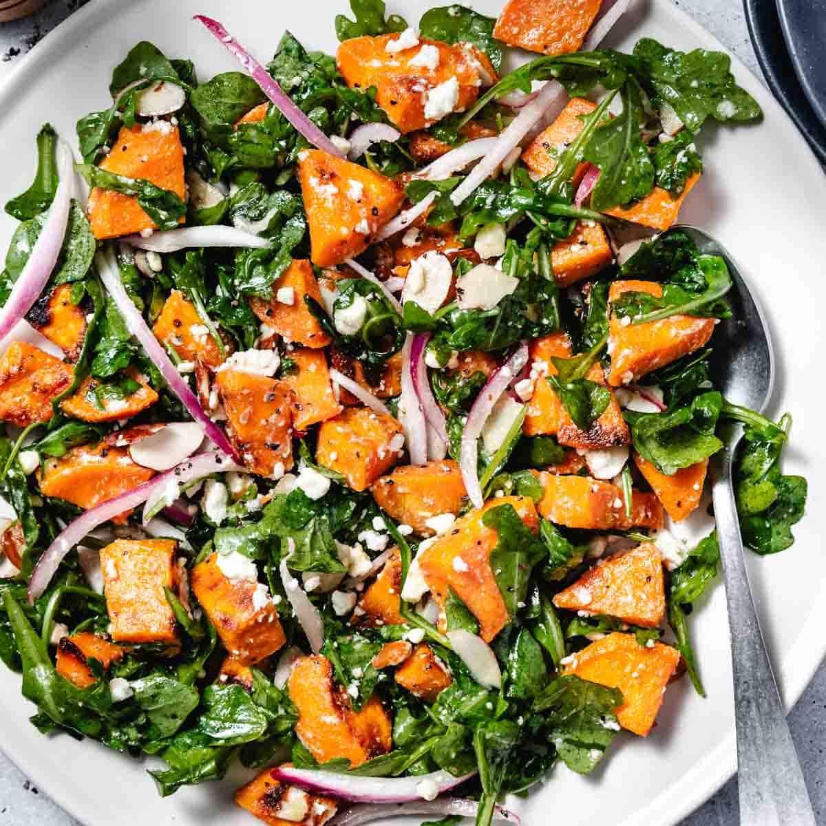 Roasted Sweet Potato Arugula Salad with Feta and Almonds