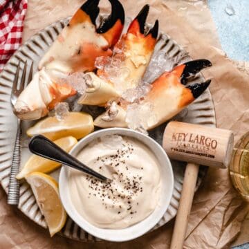 key west stone crabs with mustard sauce and mallet.