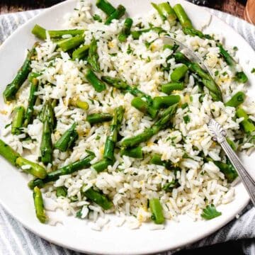 Bowl of rice with asparagus and lemon zest.