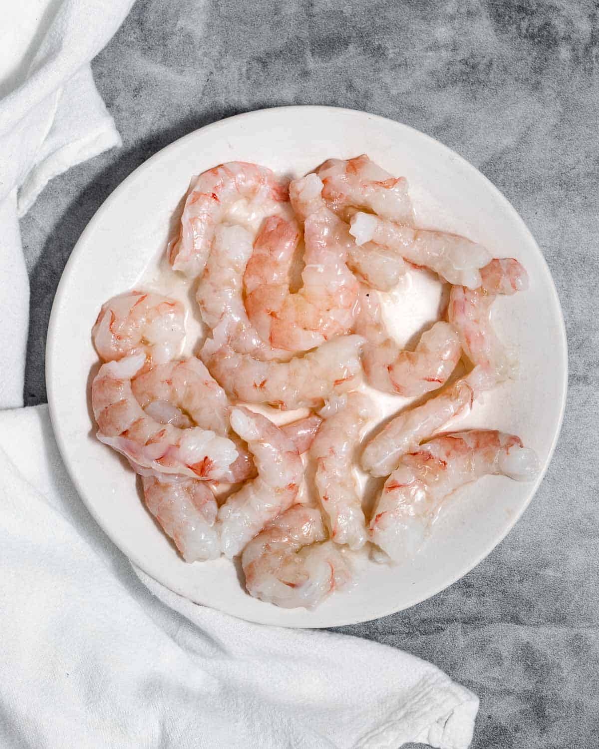 Shrimp on a white plate.
