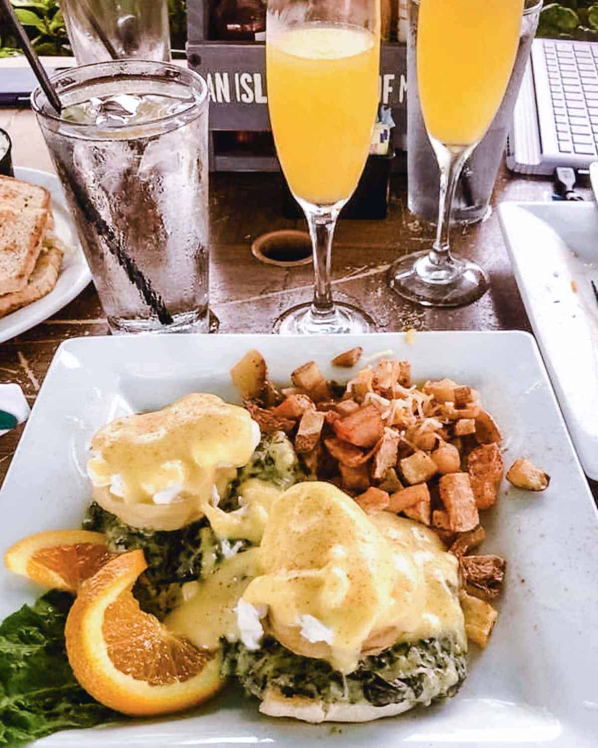 Eggs benedict with potatoes and mimosas at Buzzards in Key Largo.