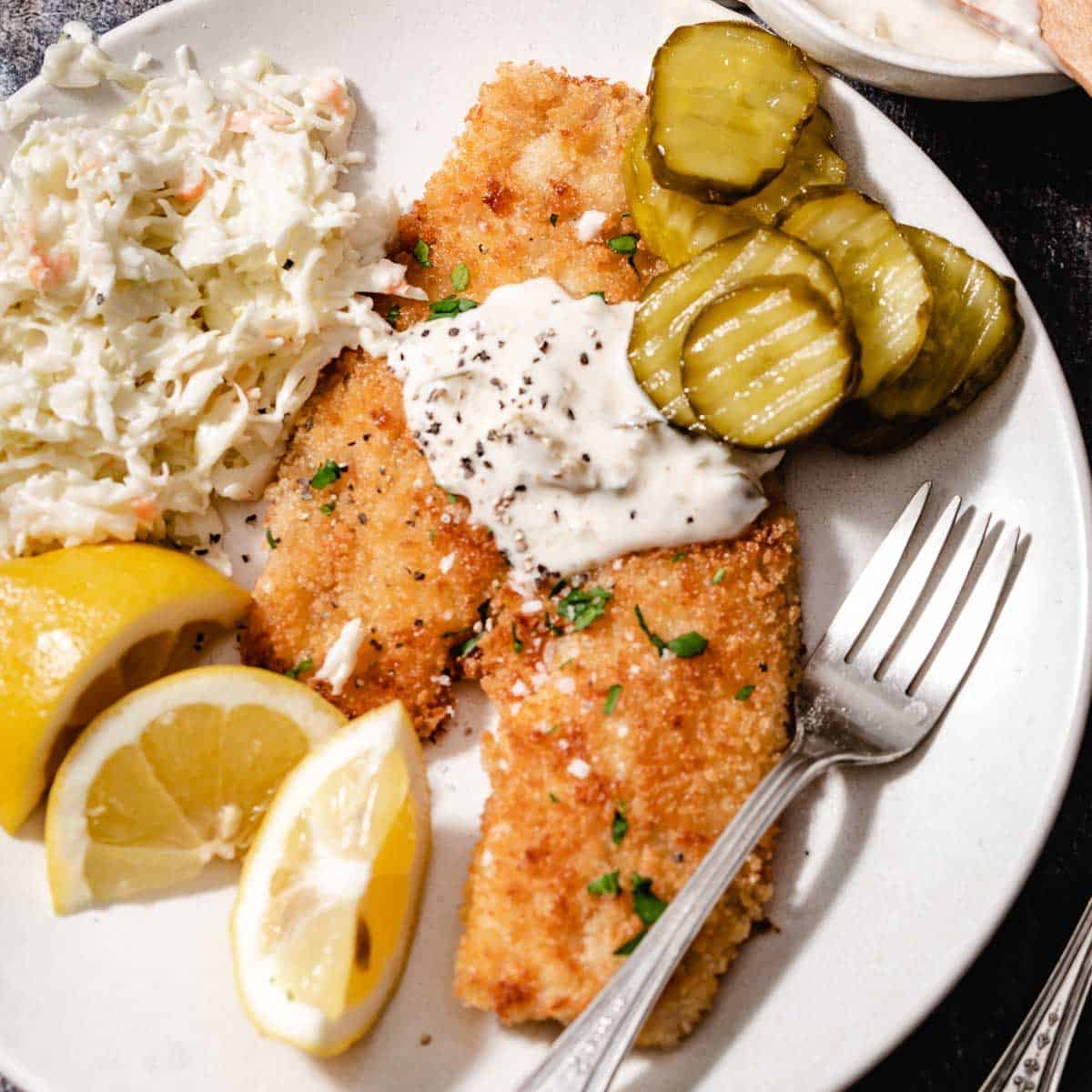 Panko-crusted snapper with pickles and cole slaw.