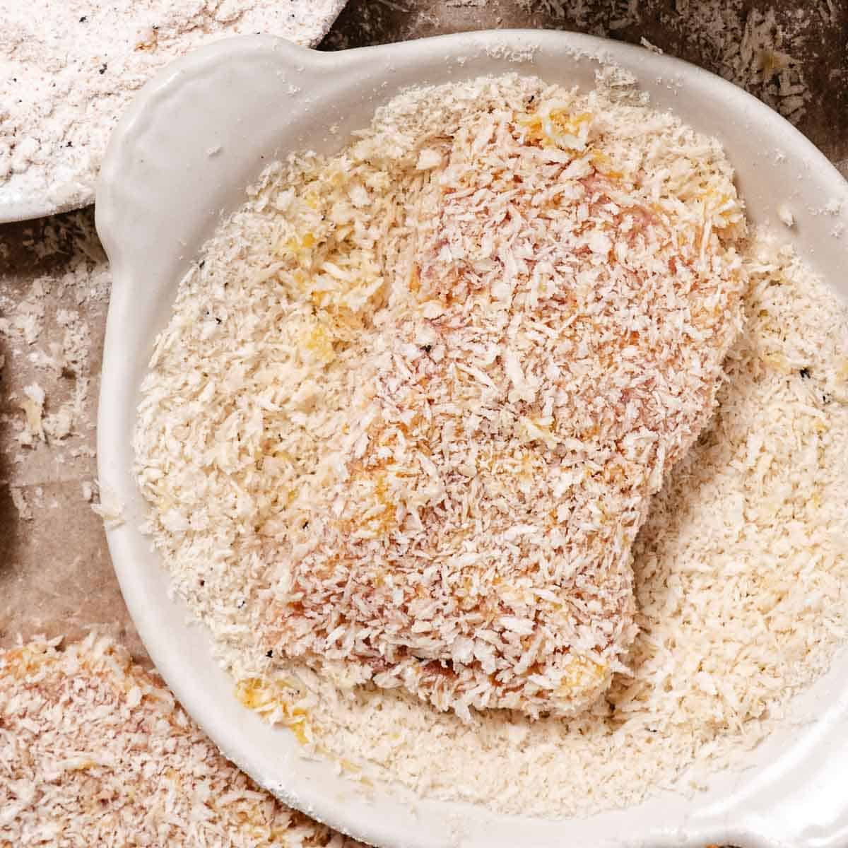 Red snapper fillet pressed into panko breadcrumbs for a crispy coating before pan frying