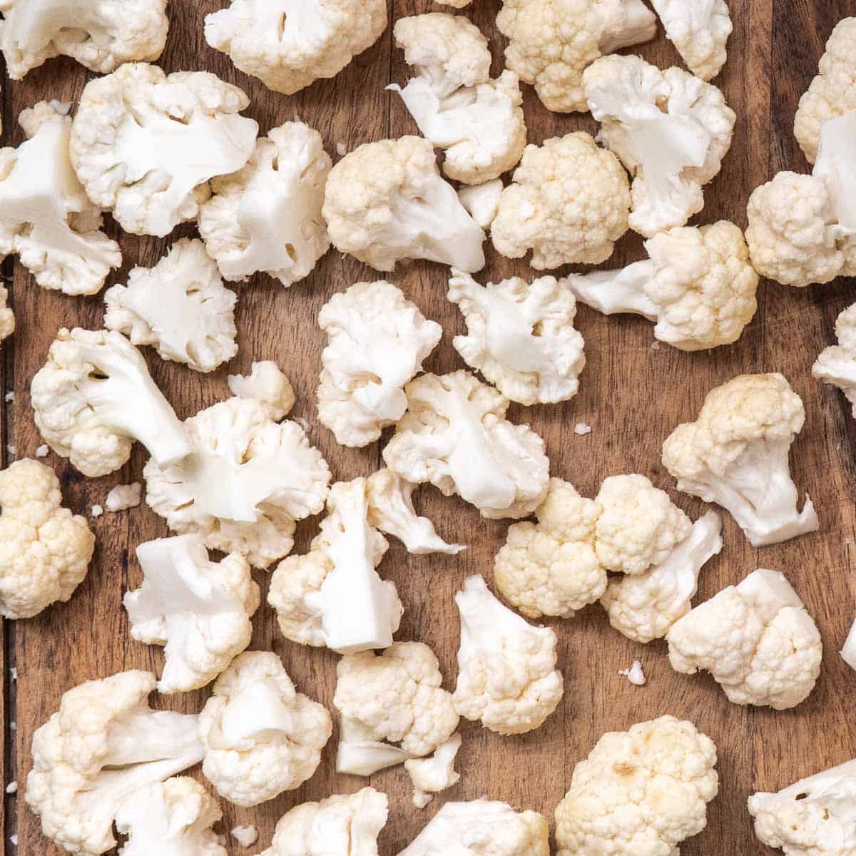 Cauliflower florets cut into bite-size pieces for the air fryer.