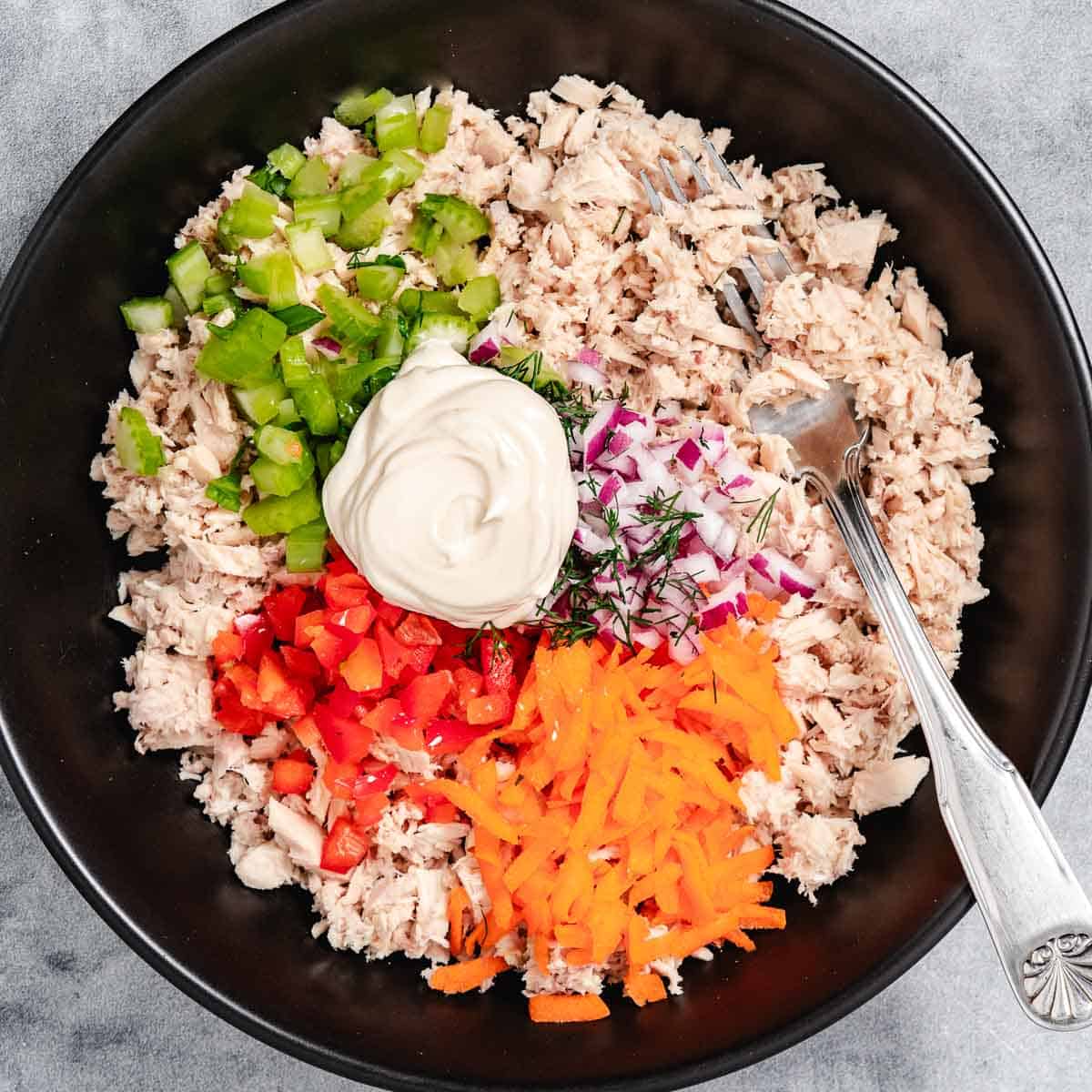 Veggie tuna in black bowl.