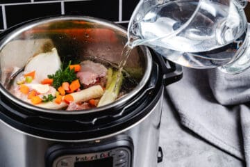 Instant pot with chicken and veggies.