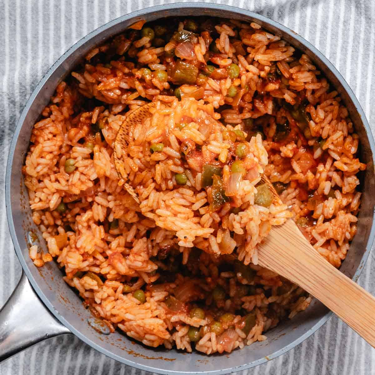 cooking Spanish rice in a pot.