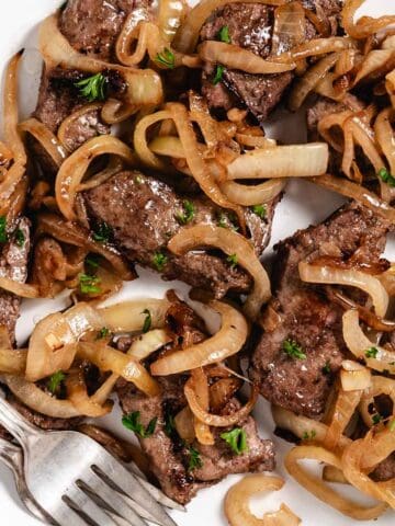 Veal liver with golden brown onions.