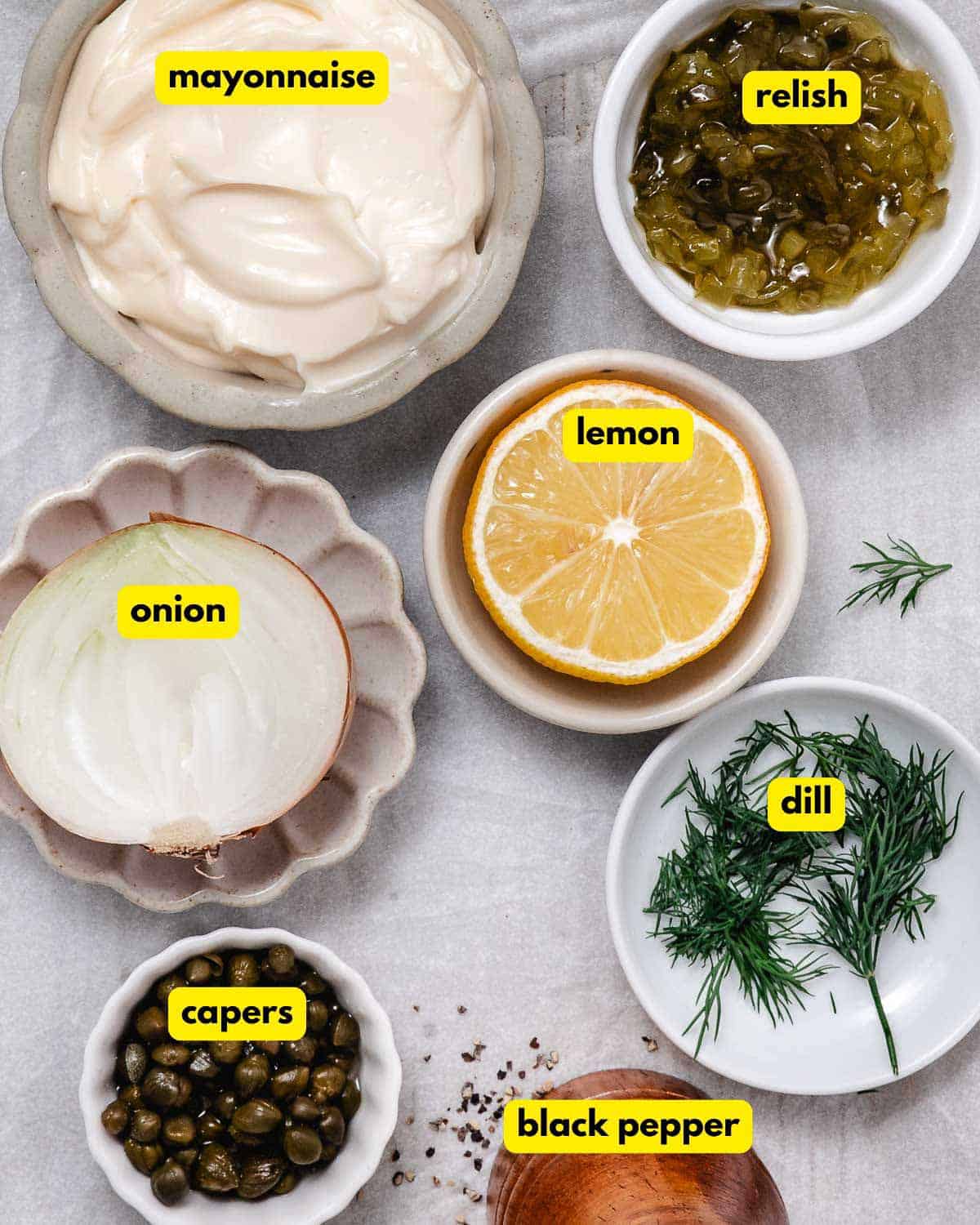 tartar sauce ingredients including pickles, onion, lemon, capers, dill, and black pepper.