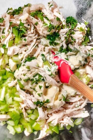 bowl of chicken salad with celery and mayo