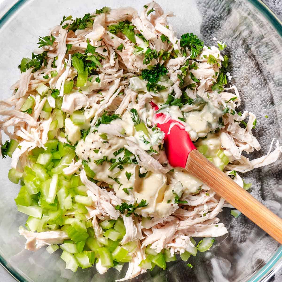 bowl of chicken salad with celery and mayo