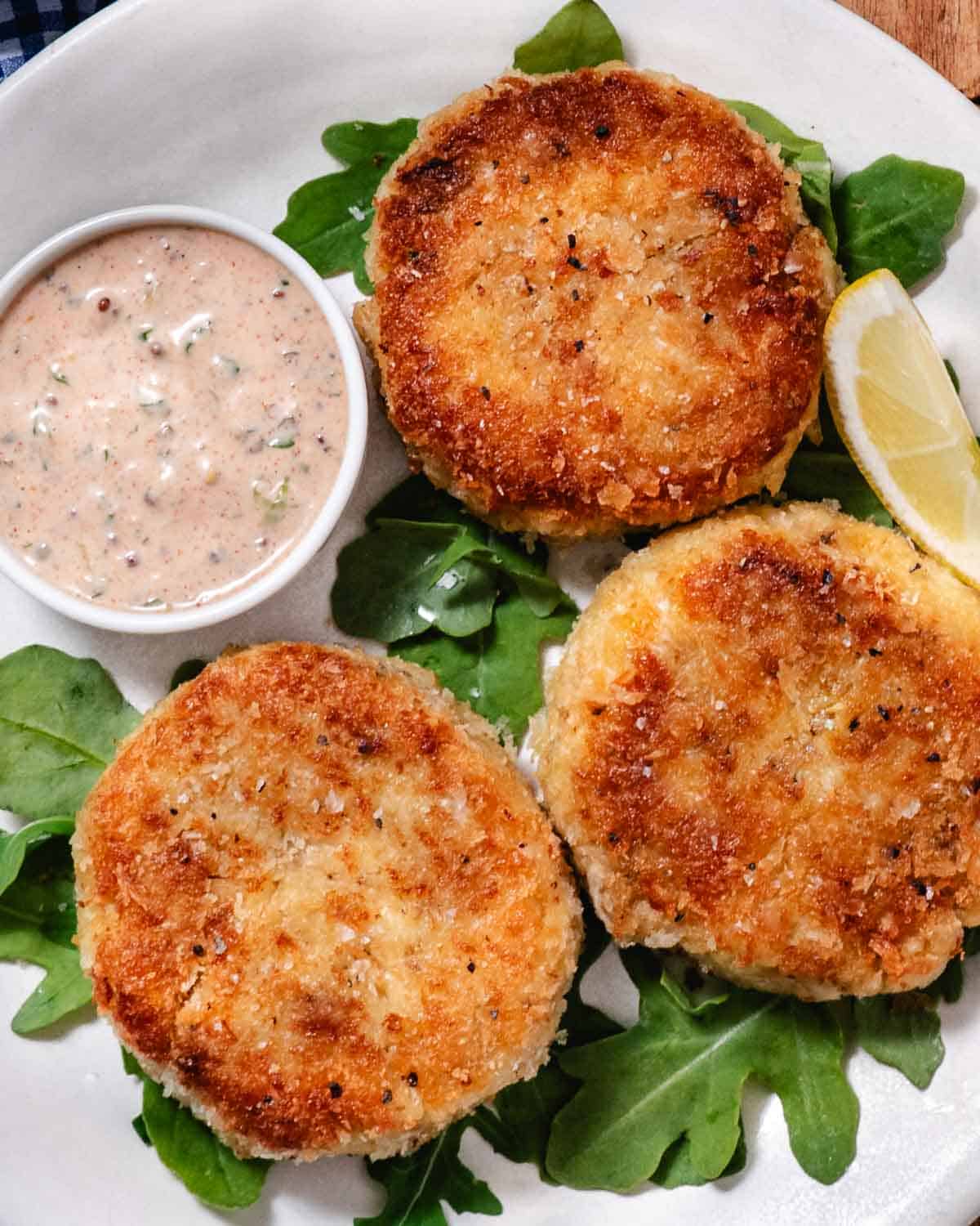 Golden panko crab cakes served with creamy remoulade and fresh lemon.