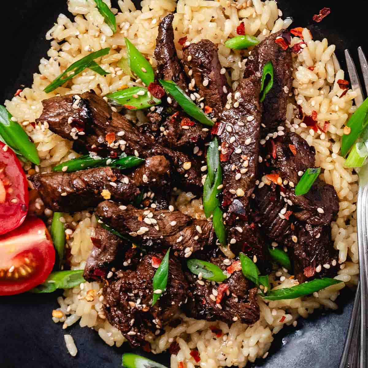 beef stir fry with rice and tomatoes