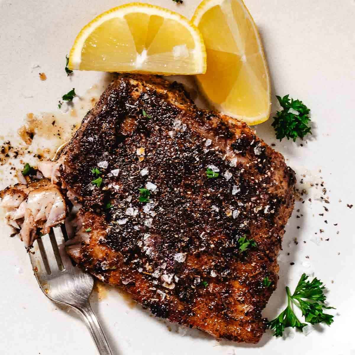 blackened tripletail on a plate