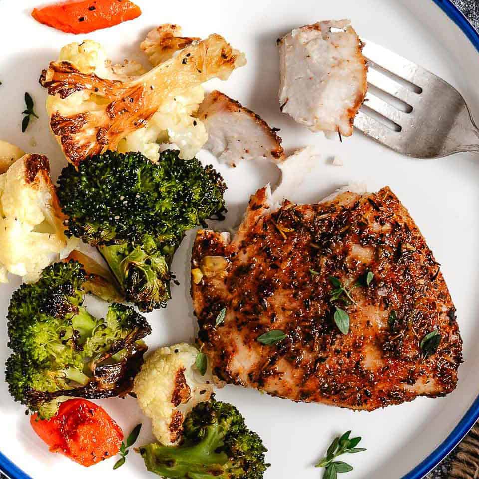 fresh fish with roasted broccoli and carrots