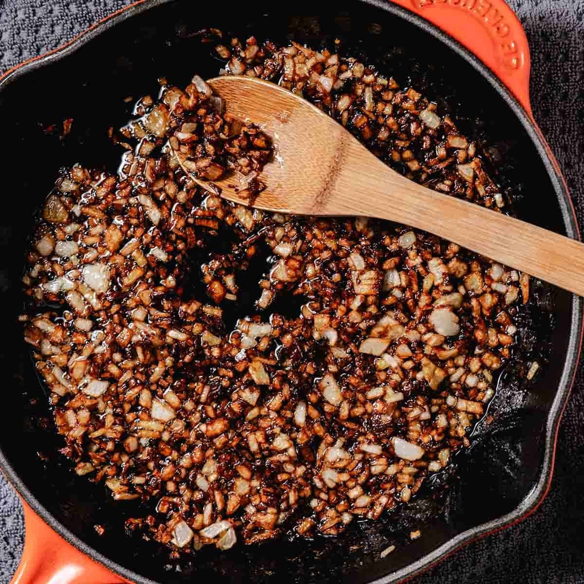 frying onions in a skillet