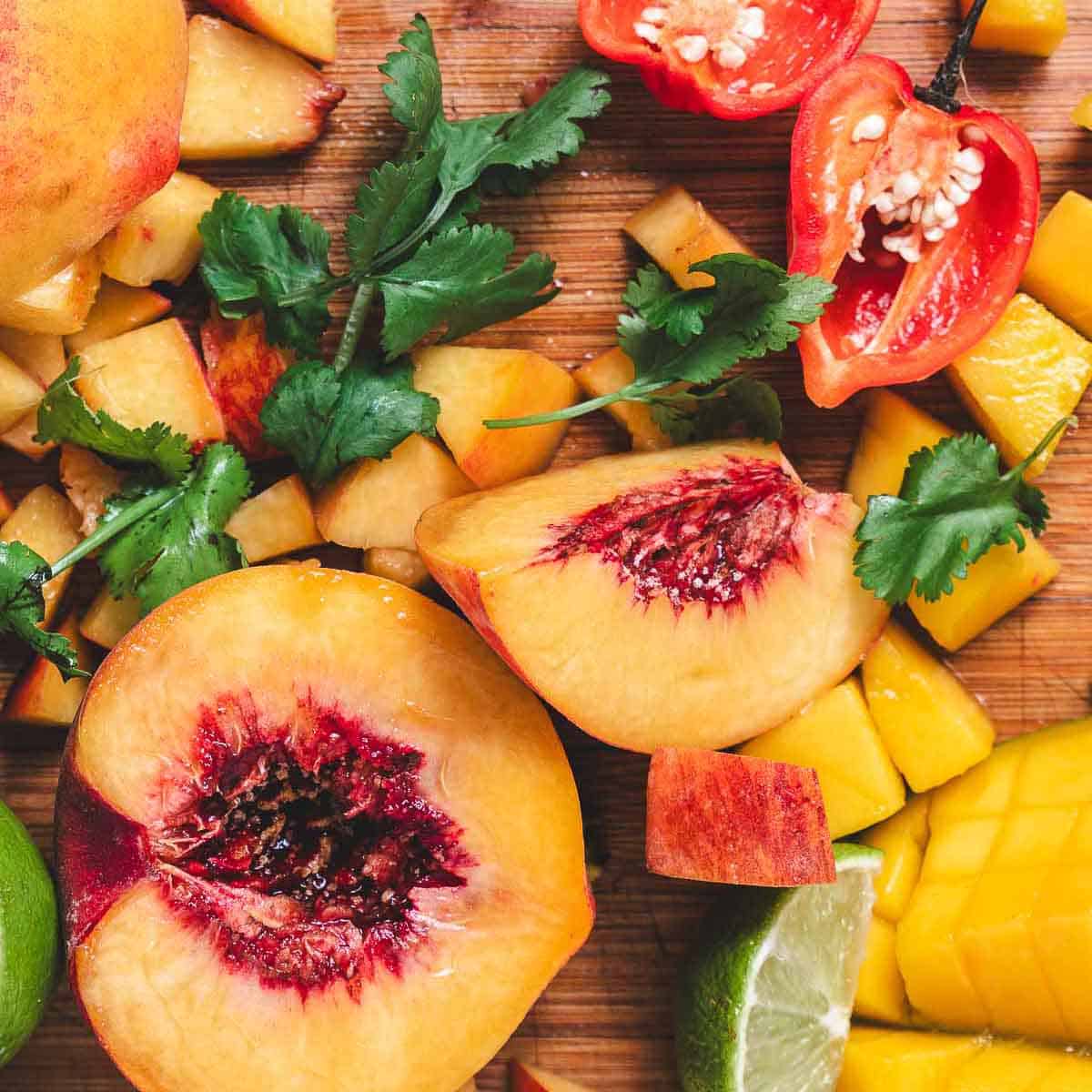 peaches, cilantro, peppers, lime, mango