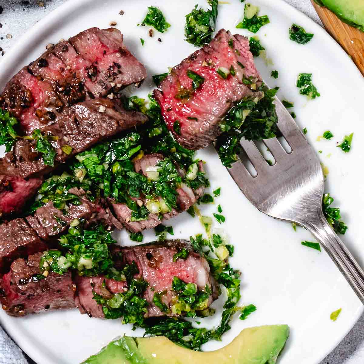 overhead view of steak with gremolata
