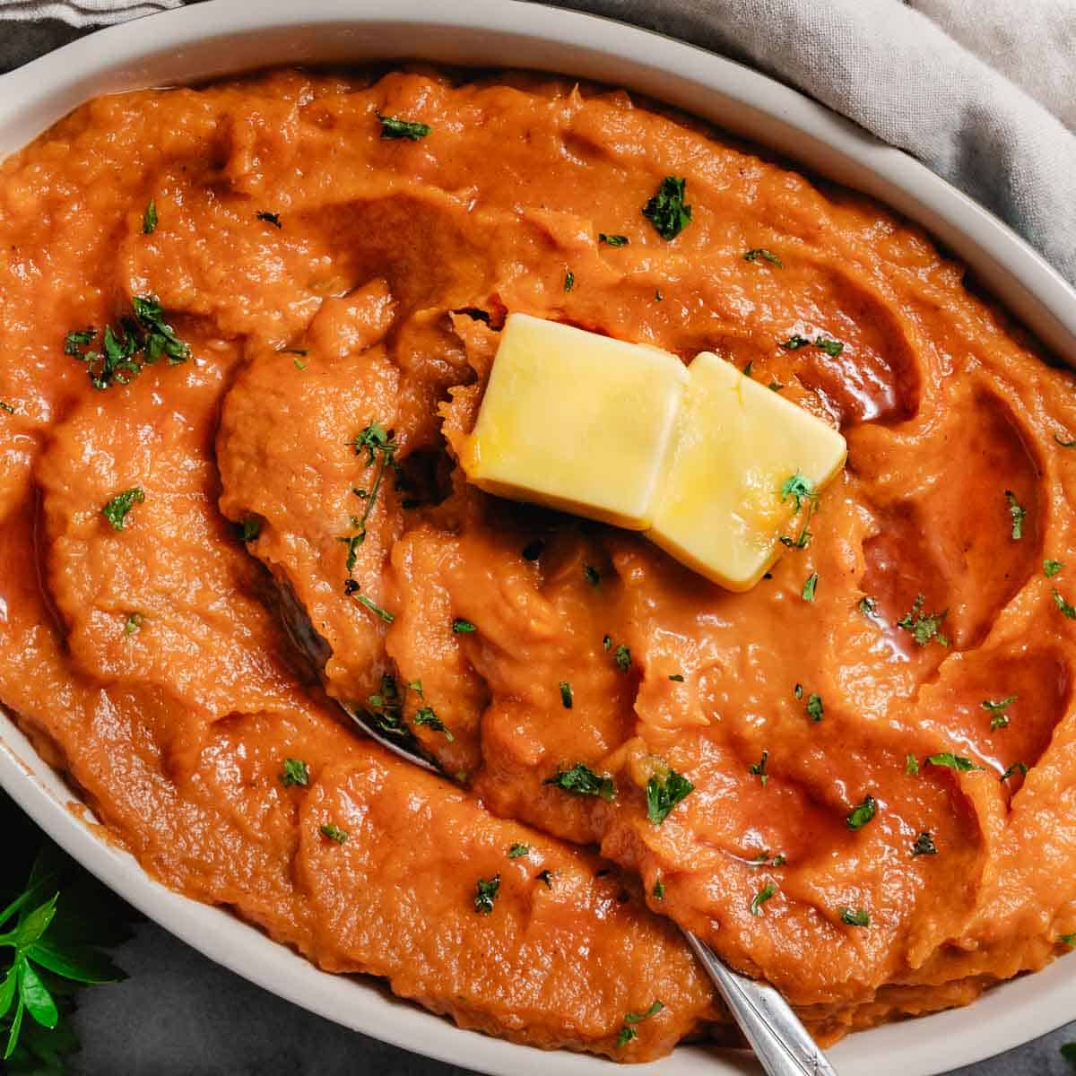 whipped sweet potatoes seasoned with pumpkin pie spice and butter.