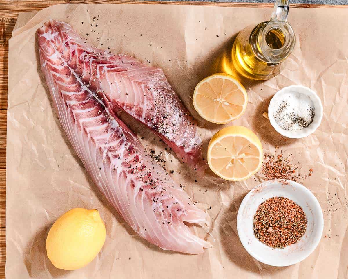 Yellowtail snapper with oil and spices.