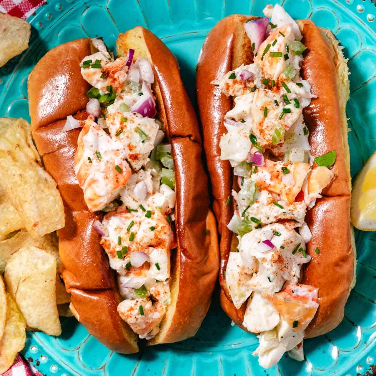 key west spiny lobster rolls on teal plate