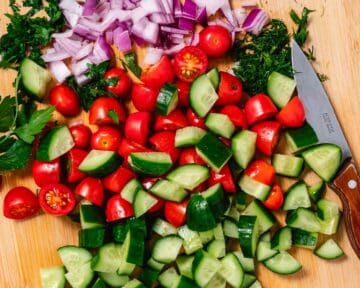 chopped cucumber, tomato, onion, parsley and dill