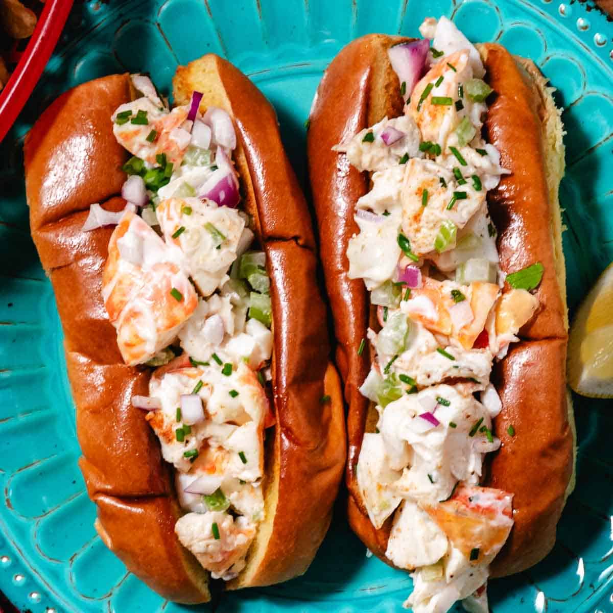 key west spiny lobster rolls on teal plate