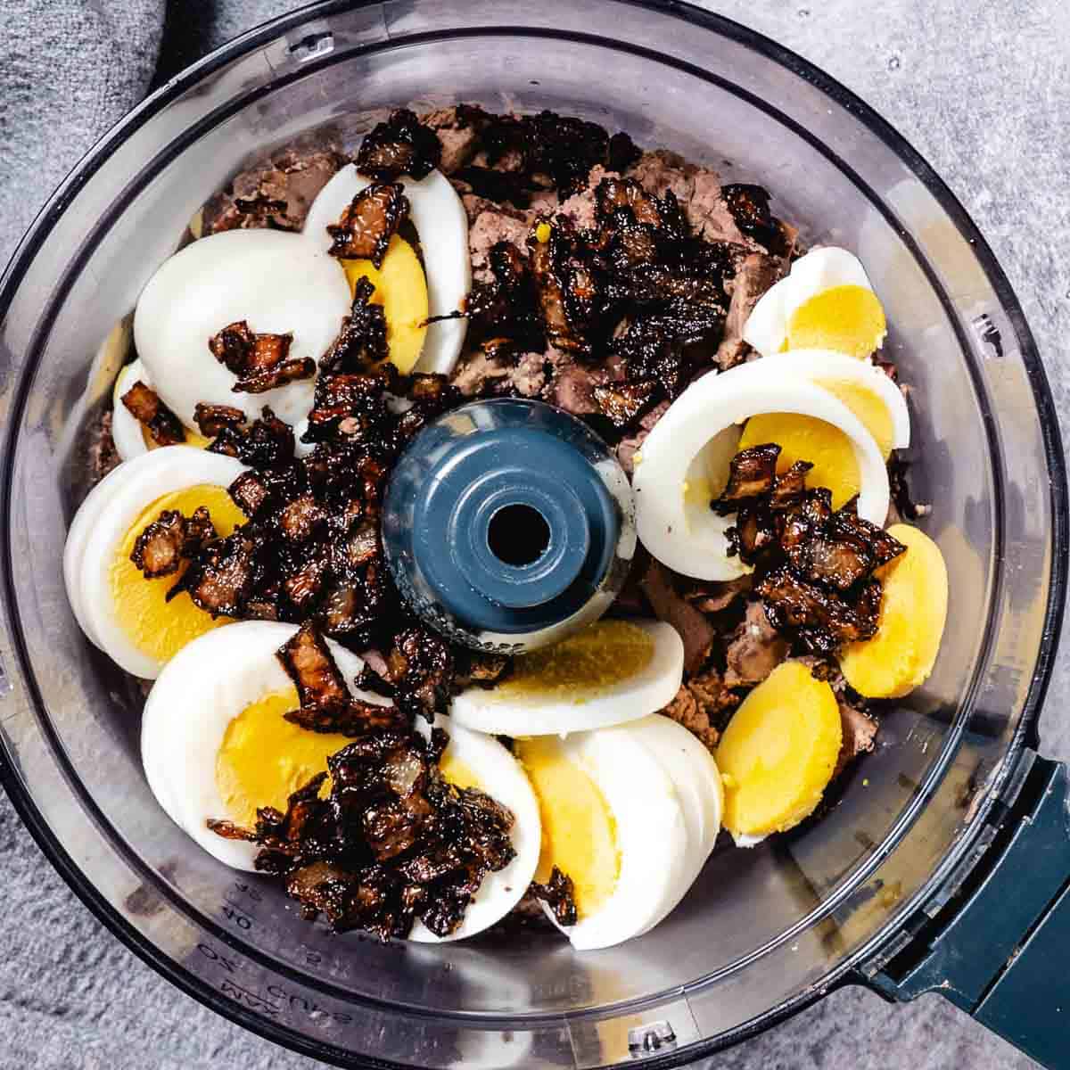 blending liver, eggs and onions in a food processot