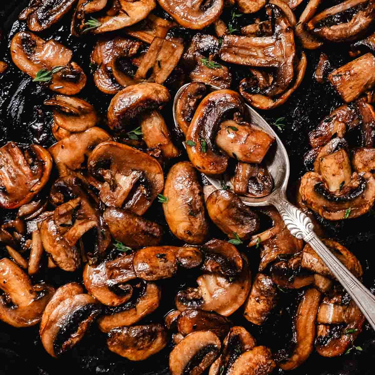 sauteed mushrooms in cast iron skillet