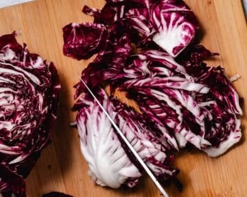 slicing radicchio with a knife