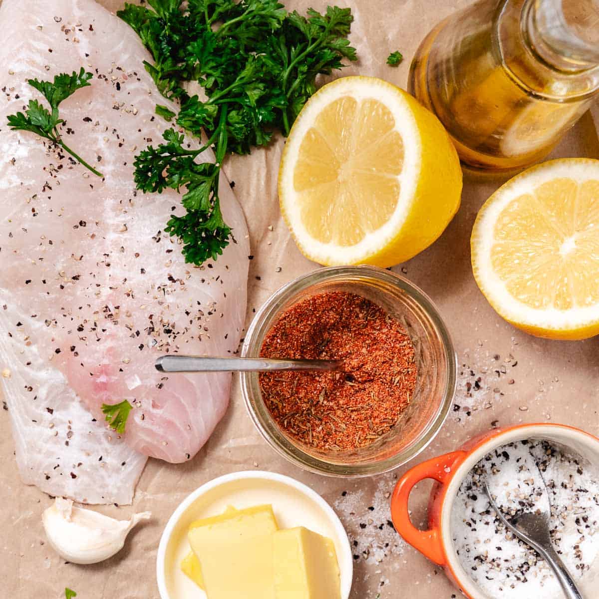 Fresh hogfish fillets with lemon, butter, garlic, parsley, and blackened seasoning.