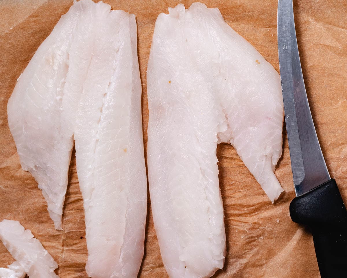 removing the bones from 2 hogfish fillets