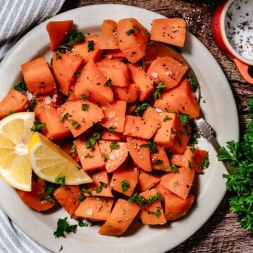 Overhead image of cut sweet potatoes on a cutting board.Overhead image of cut sweet potatoes on a cutting board.