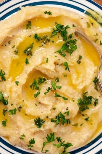 Creamy mashed potato squash finished with butter and chopped parsley.