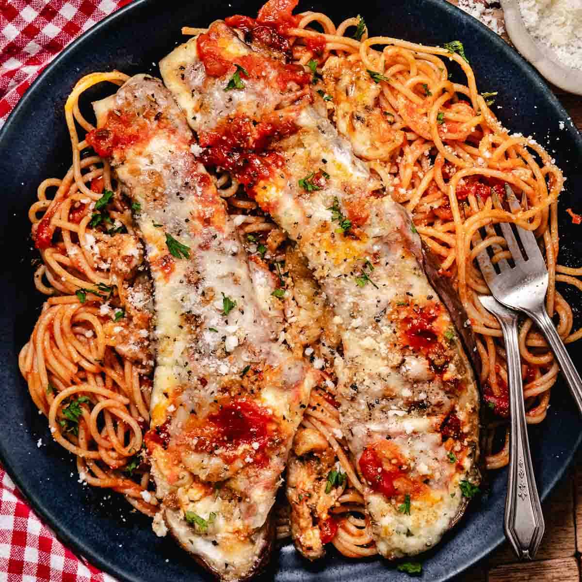 No fry eggplant parmesan with ricotta and mozzarella over spaghetti.