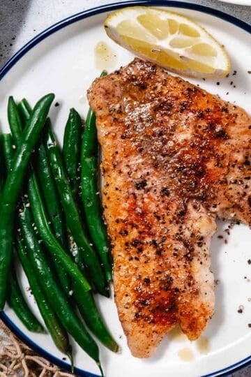 Pan seared fish with sauteed green beans