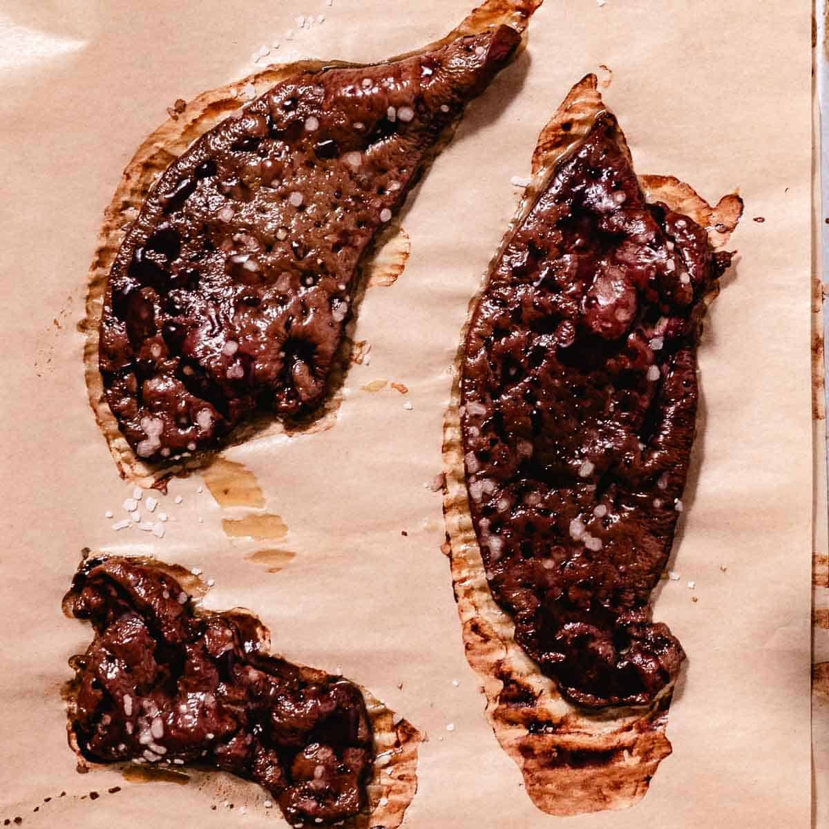 Baking beef liver on a sheet pan.