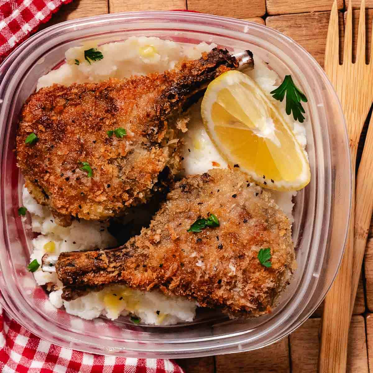 Leftover panko breaded lamb chops served over mashed potatoes with lemon and parsley