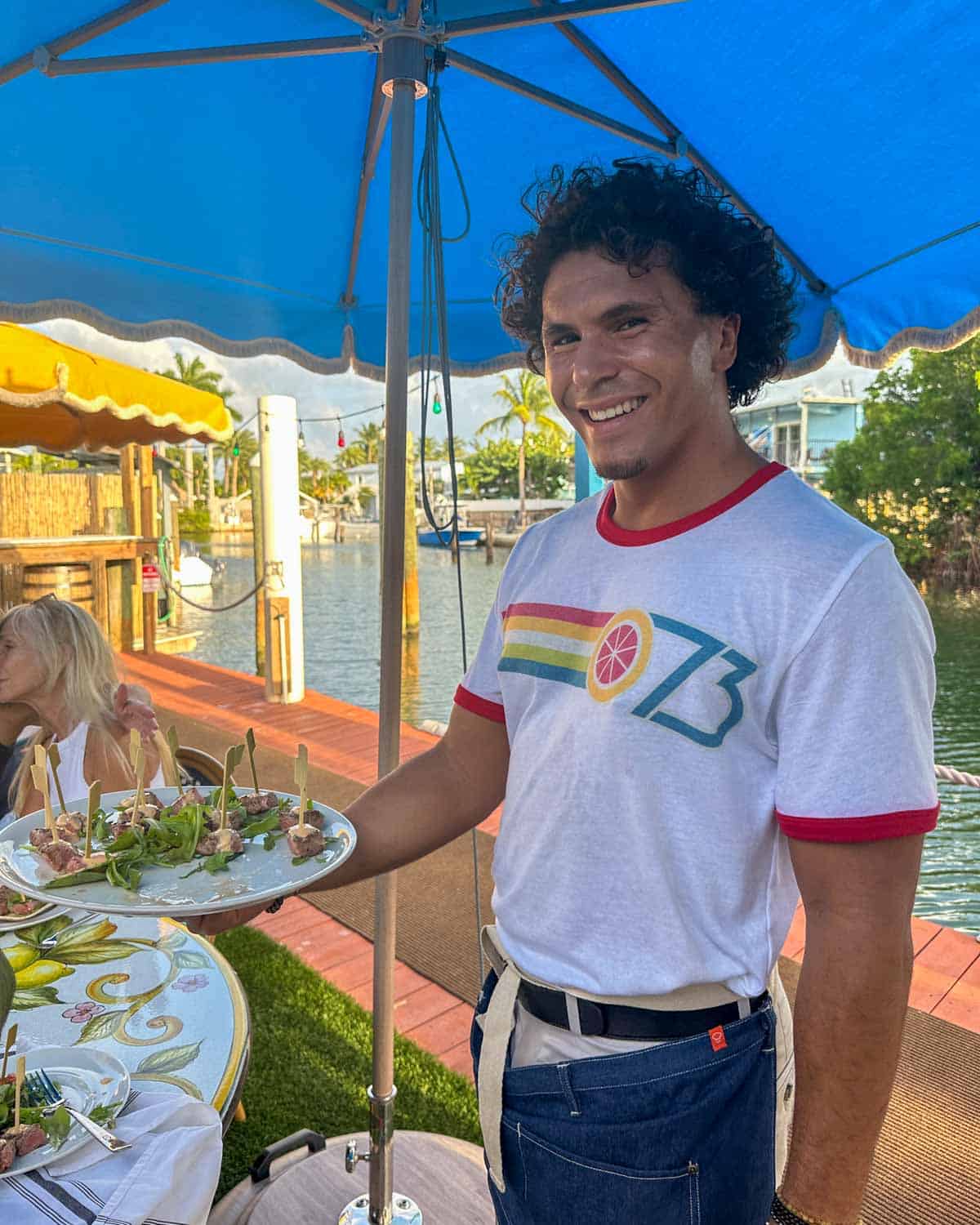 Server at Lido 73 restaurant in Tavernier