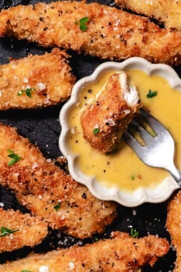 Crispy panko chicken strips served with honey mustard dipping sauce