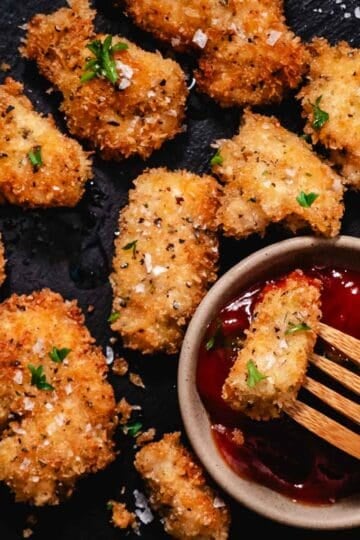 Panko chicken nuggets served with ketchup dipping sauce