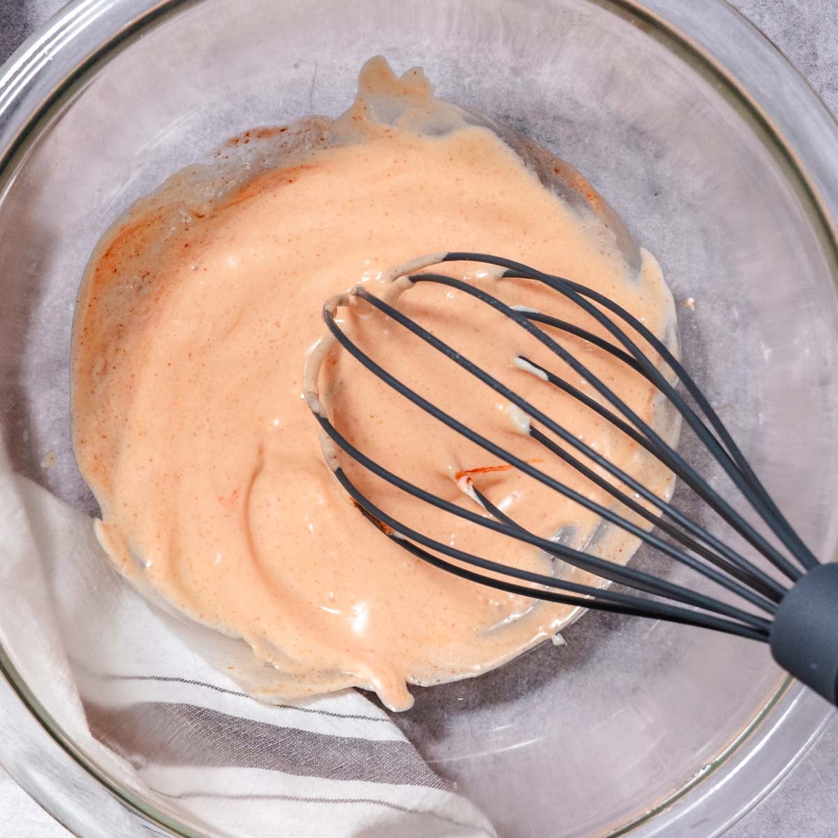 mixing spicy mayo dressing